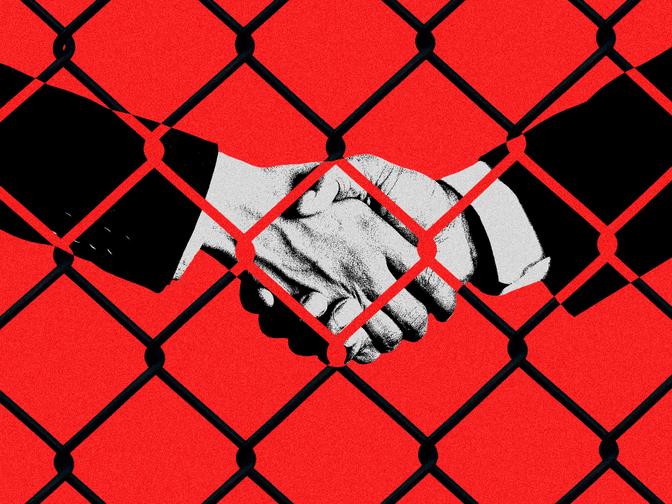 Zwei Hände, die sich durch einen schwarzen Maschendrahtzaun vor rotem Hintergrund die Hand reichen, als Symbol für Hindernisse bei der Einigung oder Zusammenarbeit.