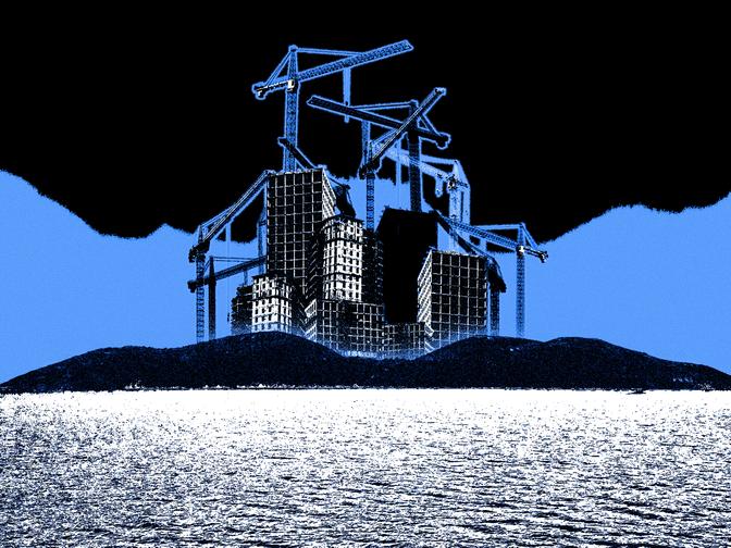 Die Insel Sazan mit im Bau befindlichen Hochhäusern und vielen Kränen, umgeben von Wasser, vor einem dunklen Himmel.