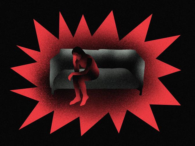 Eine Person sitzt auf einem Sofa, umgeben von einem roten, sternförmigen Lichtstrahl, der intensive Emotionen oder seelische Not zum Ausdruck bringt.